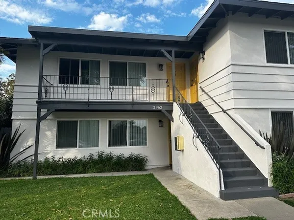 a view of house with yard