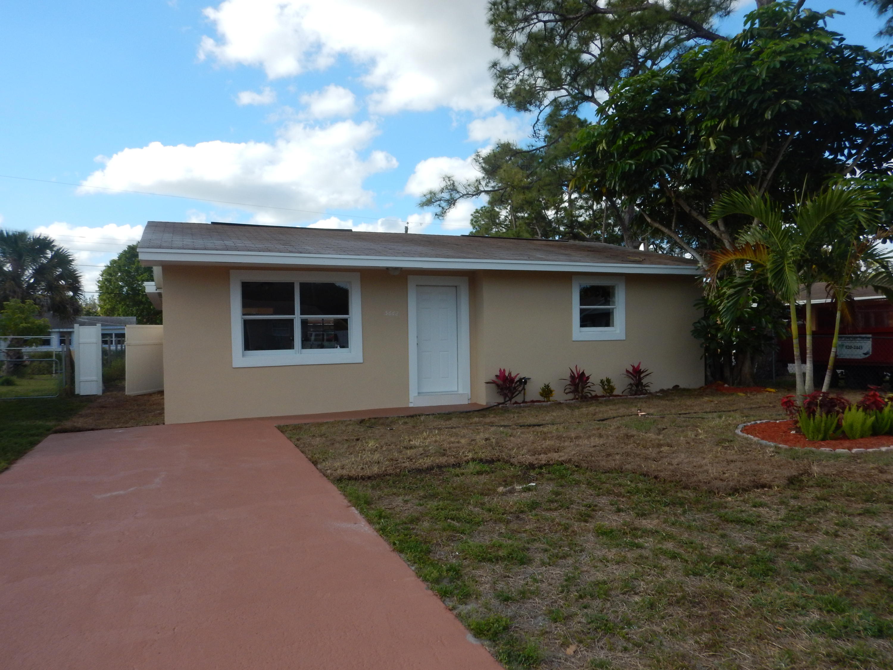 5662 Papaya Road West Palm Beach, FL 33413 - Photo 1 of 19 Front Home