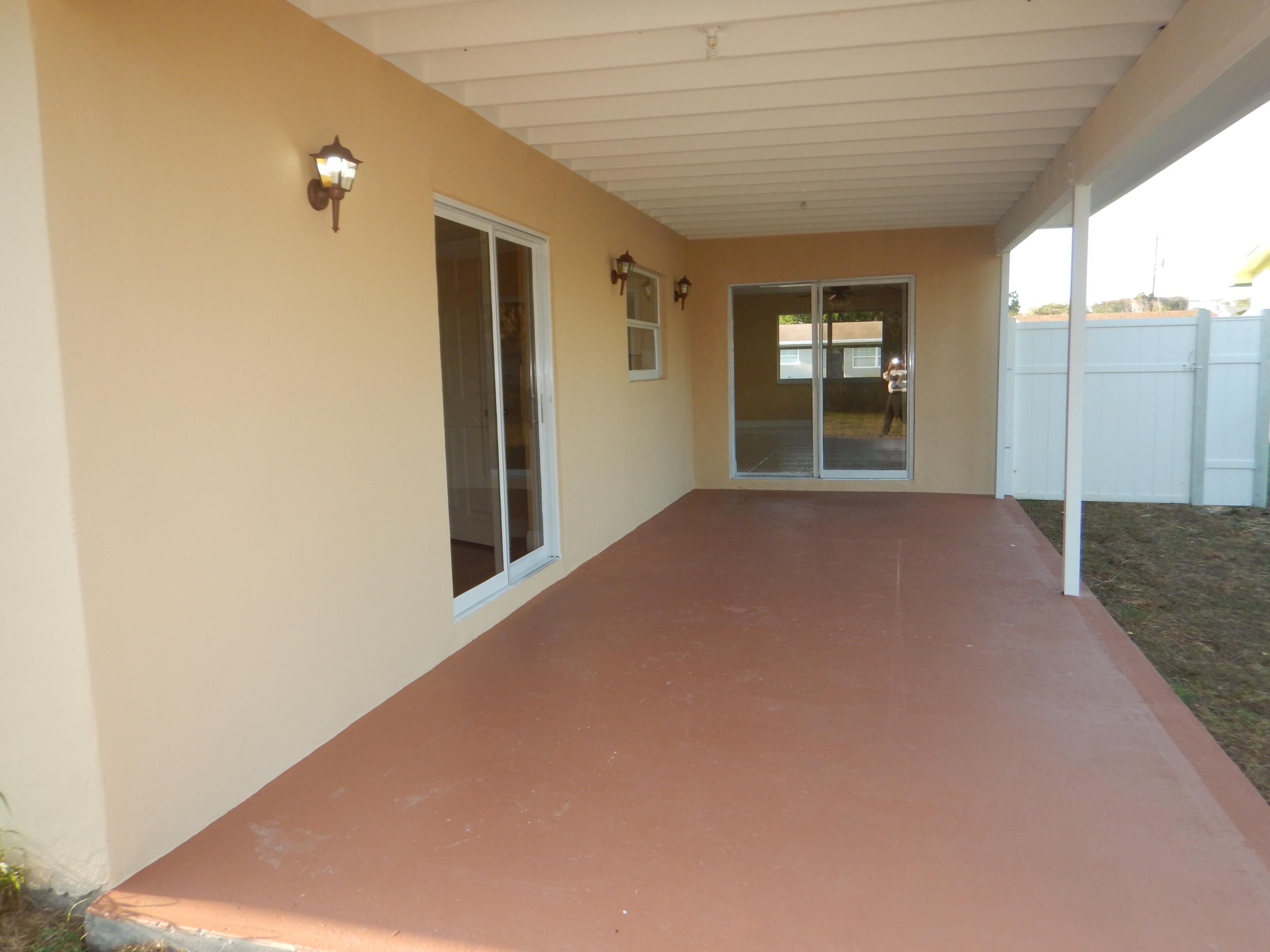 5662 Papaya Road West Palm Beach, FL 33413 - Photo 17 of 19 Covered Patio