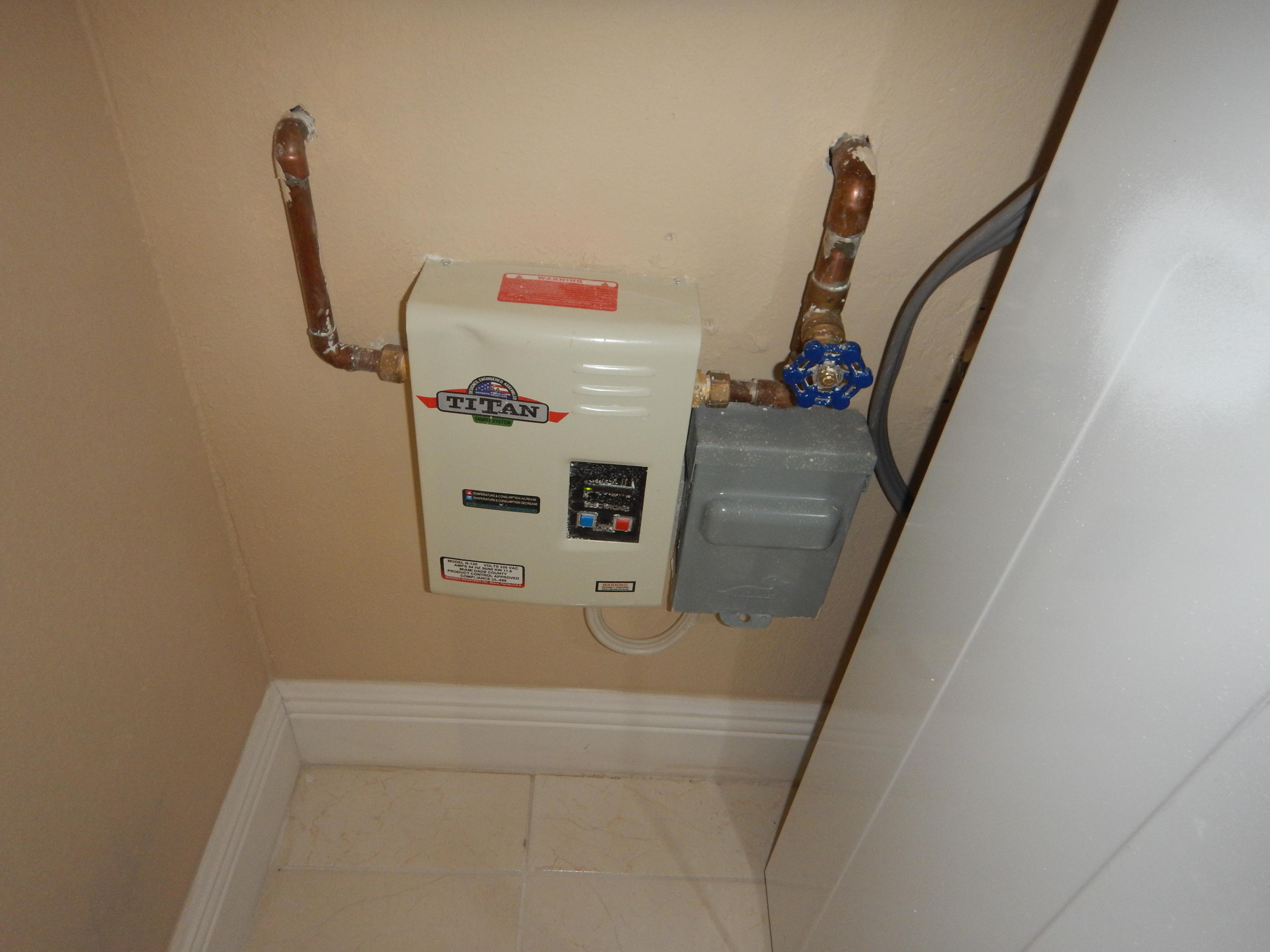 5662 Papaya Road West Palm Beach, FL 33413 - Photo 7 of 19 Instant Water Heater