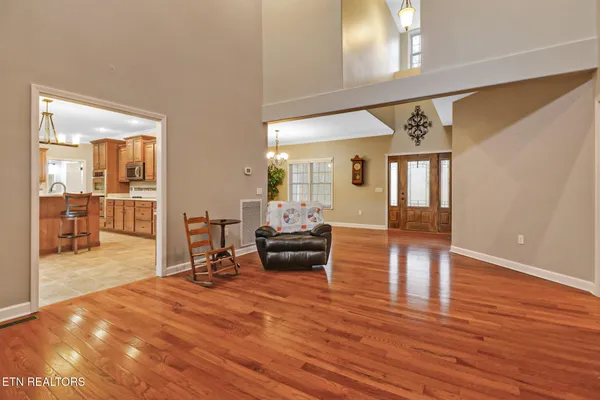 a bathroom with a bathtub sink and a mirror