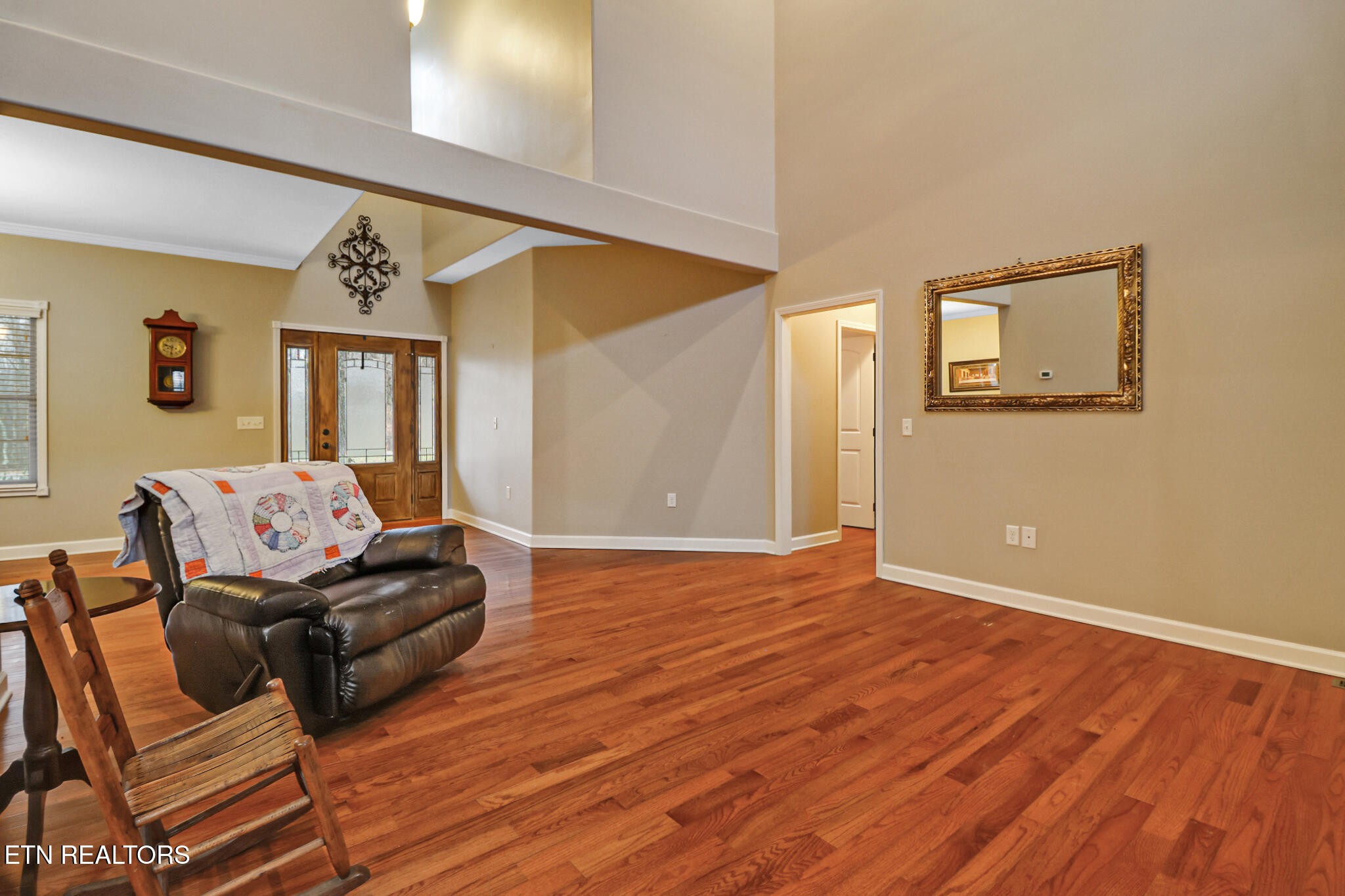 5424 Wilder Road Grimsley, TN 38565 - Photo 31 of 59 a living room with furniture and a wooden floor