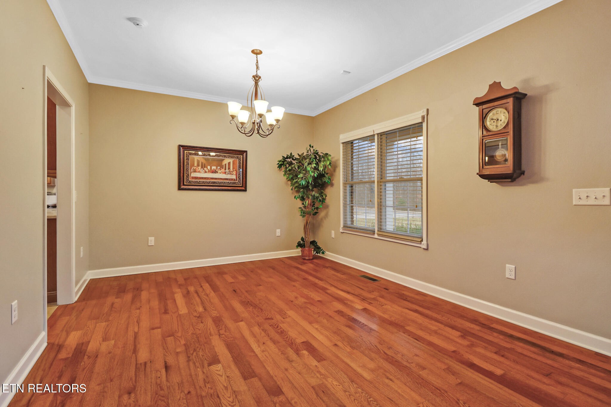5424 Wilder Road Grimsley, TN 38565 - Photo 32 of 59 a view of livingroom with window wooden floor and chandelier