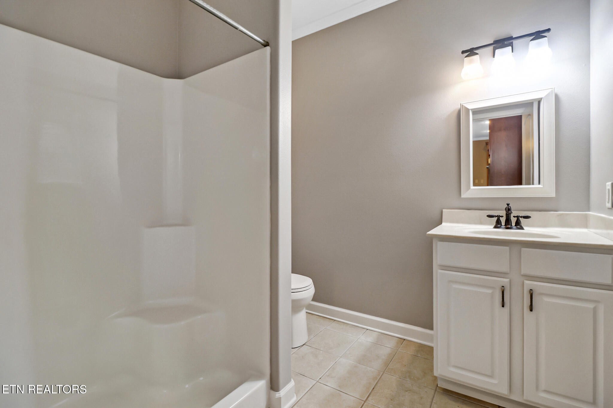 5424 Wilder Road Grimsley, TN 38565 - Photo 39 of 59 a bathroom with a sink a toilet and shower