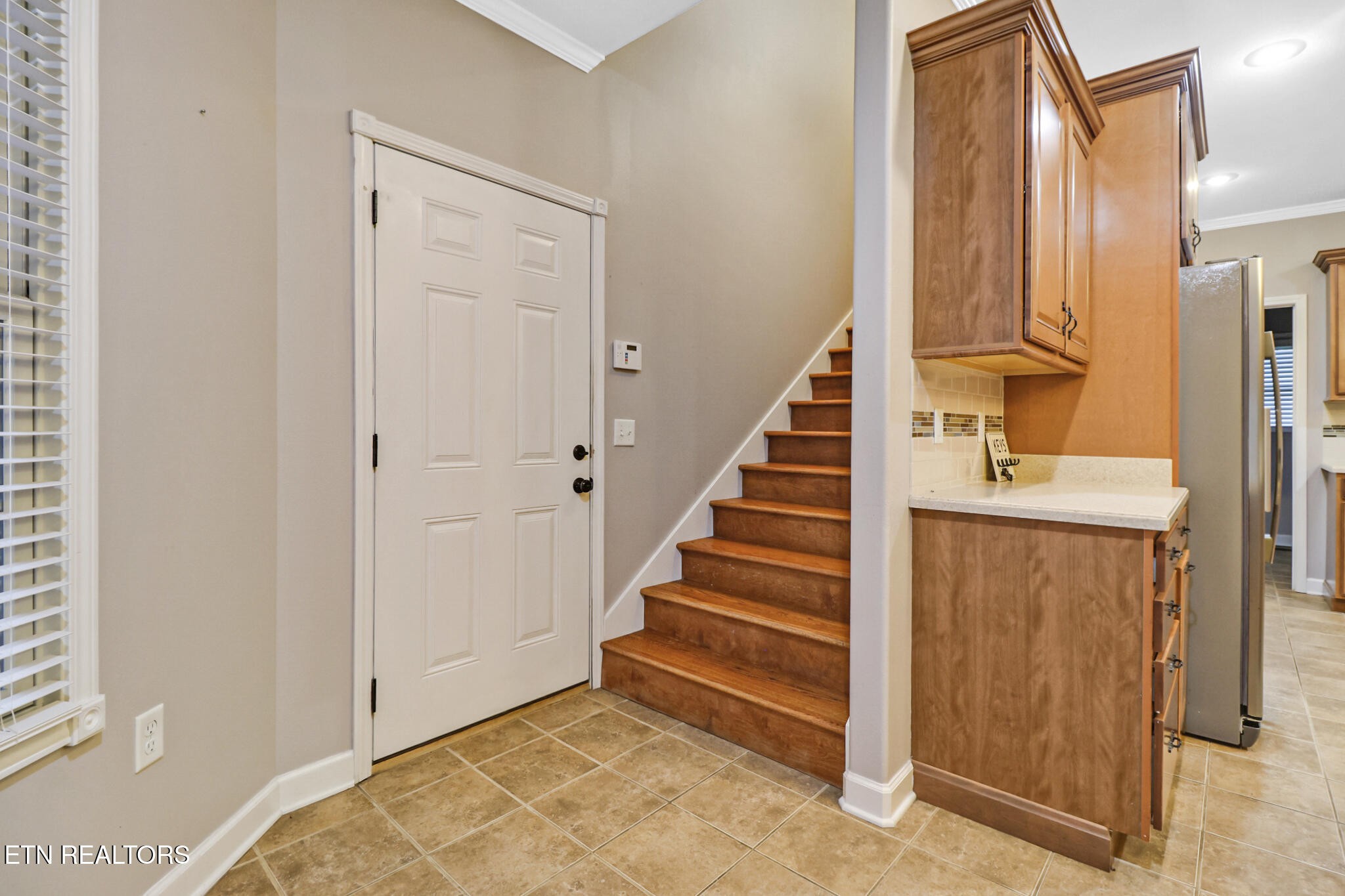 5424 Wilder Road Grimsley, TN 38565 - Photo 45 of 59 a view of front door with hallway and stairs