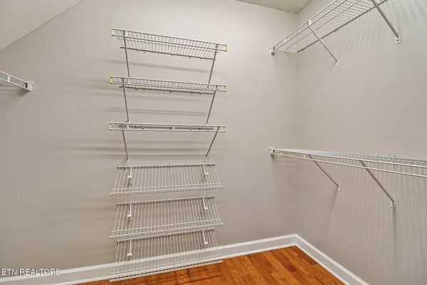 a room with furniture and mirror