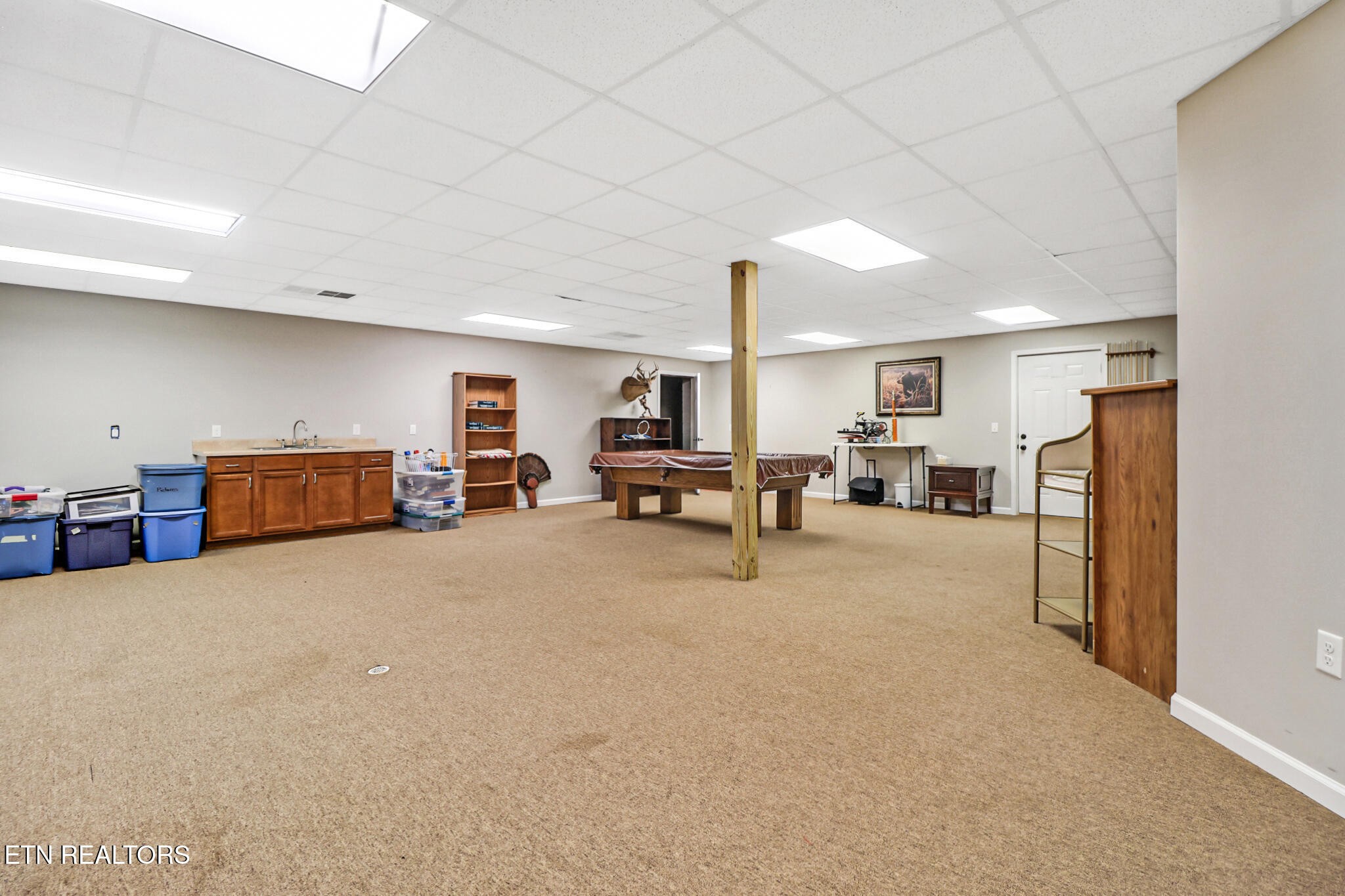 5424 Wilder Road Grimsley, TN 38565 - Photo 53 of 59 a living room with furniture and a refrigerator