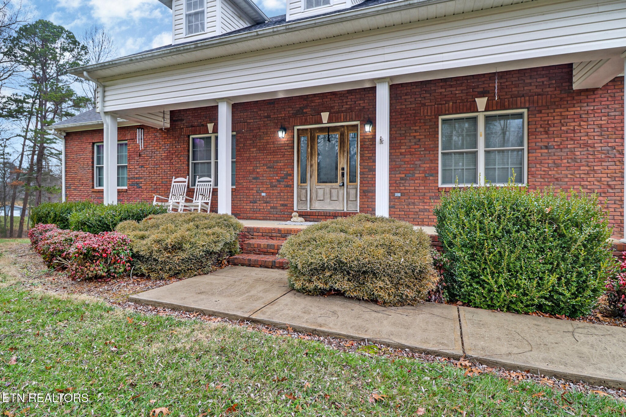 5424 Wilder Road Grimsley, TN 38565 - Photo 6 of 59 a front view of a house with a garden