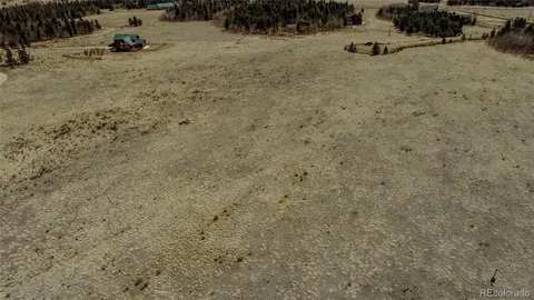 a view of an ocean beach and mountain