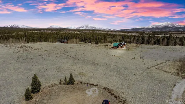 a view of swimming pool with a lake view