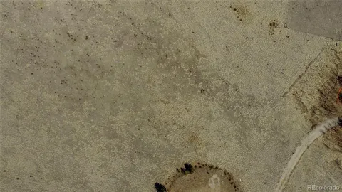 a view of a lake with mountains in the background