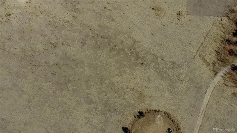 a view of a city with mountains in the background