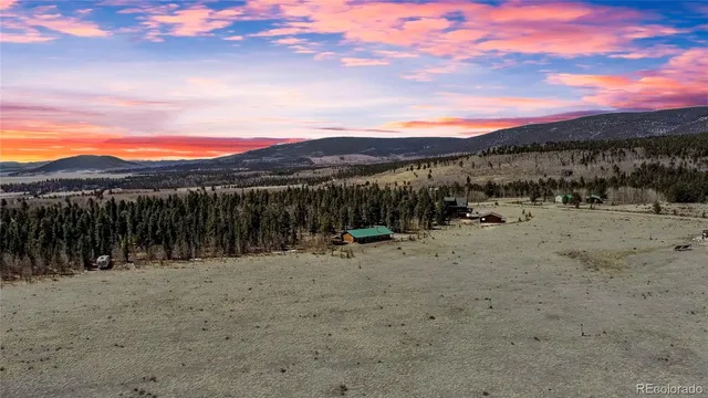 a view of a lake with a mountain
