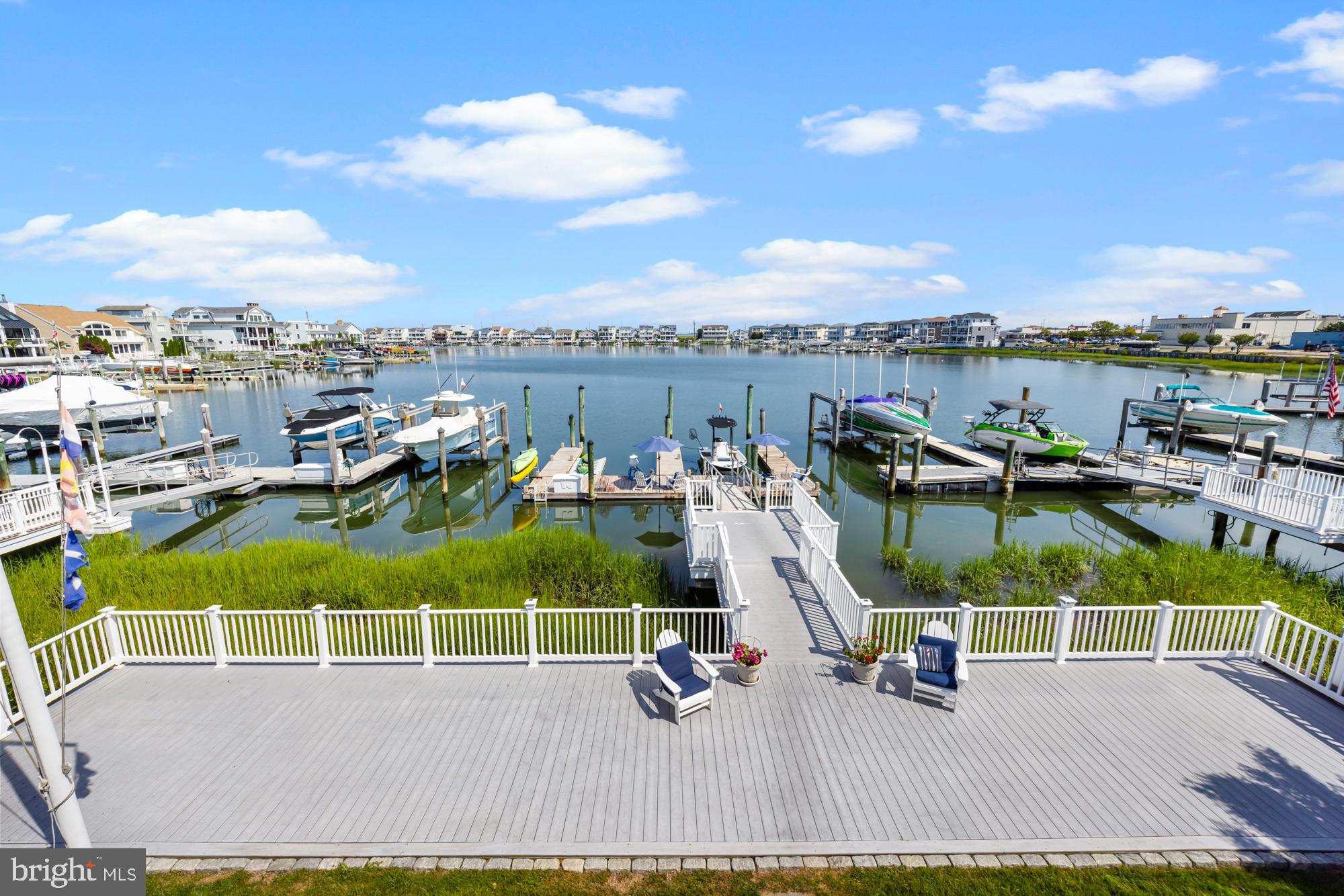87 Lagoon Boulevard Brigantine, NJ 08203 - Photo 29 of 66 an outdoor space with swimming pool and furniture