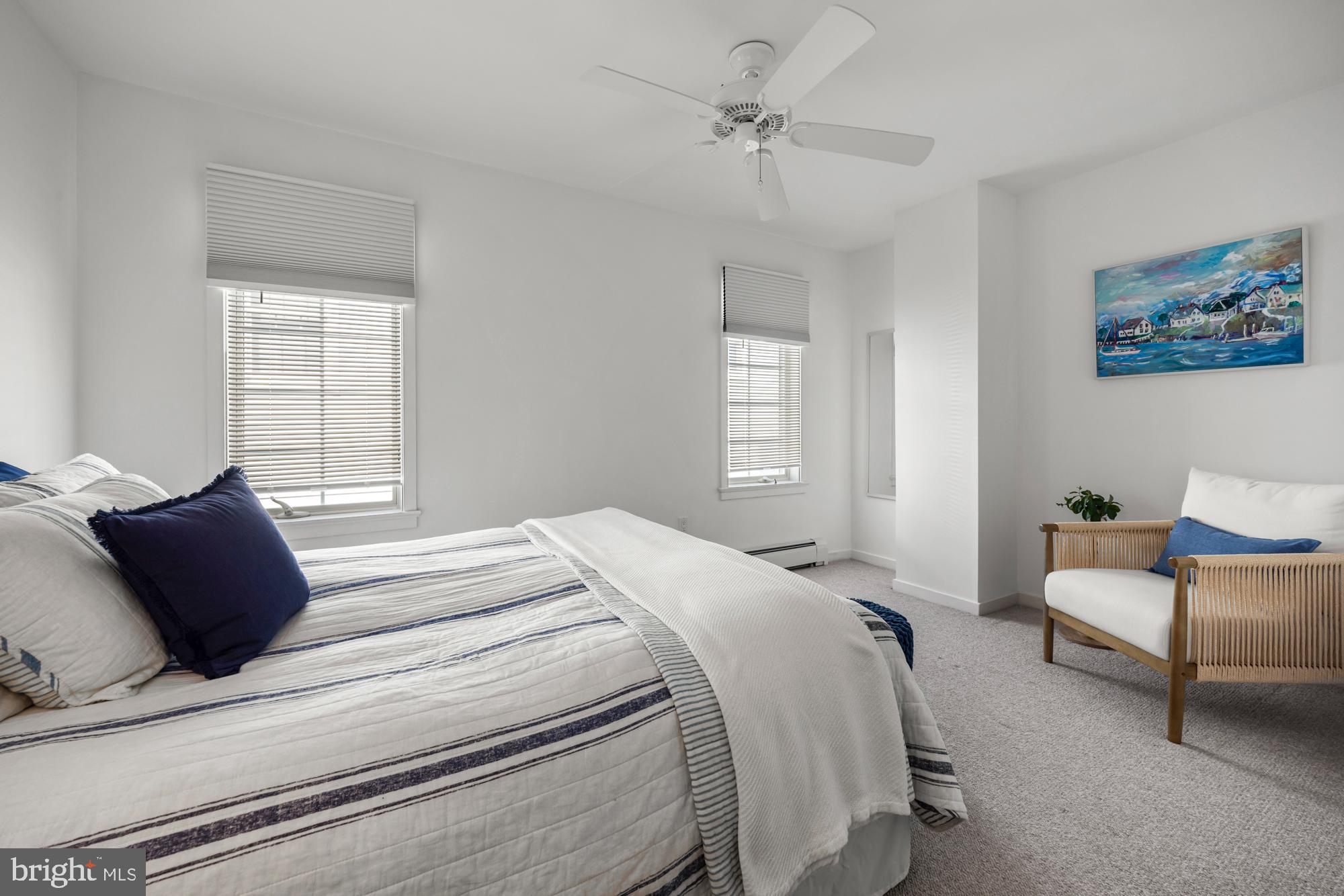 87 Lagoon Boulevard Brigantine, NJ 08203 - Photo 38 of 66 a bedroom with a bed and a window