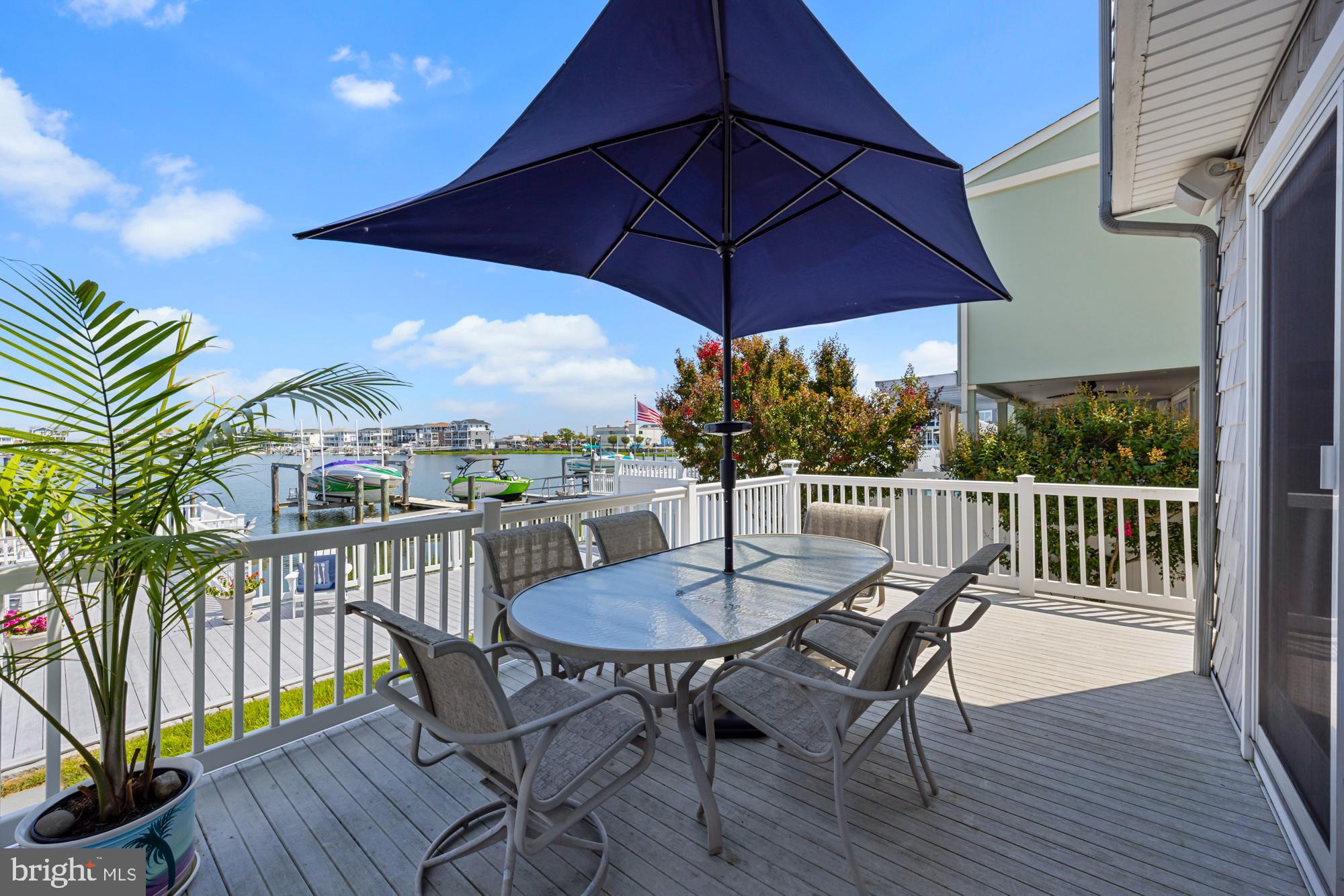87 Lagoon Boulevard Brigantine, NJ 08203 - Photo 46 of 66 a view of a balcony with furniture and wooden floor