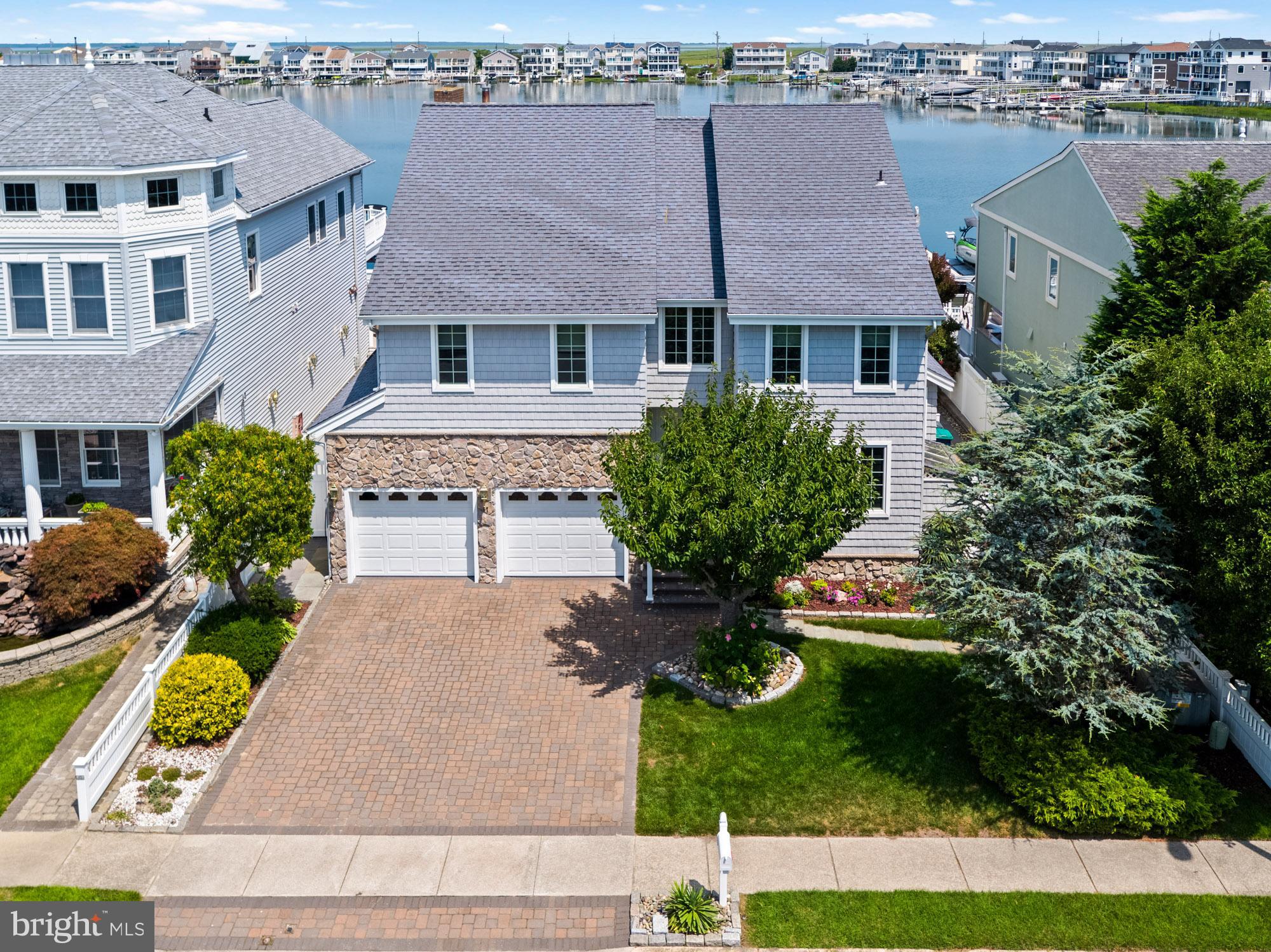87 Lagoon Boulevard Brigantine, NJ 08203 - Photo 66 of 66 an aerial view of a house with garden