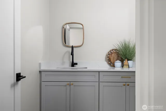 a sink with a mirror
