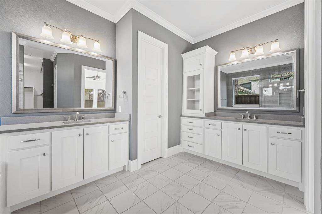 4026 North Cresthaven Road Dallas, TX 75209 - Photo 11 of 22 a spacious bathroom with a granite countertop sink mirror and