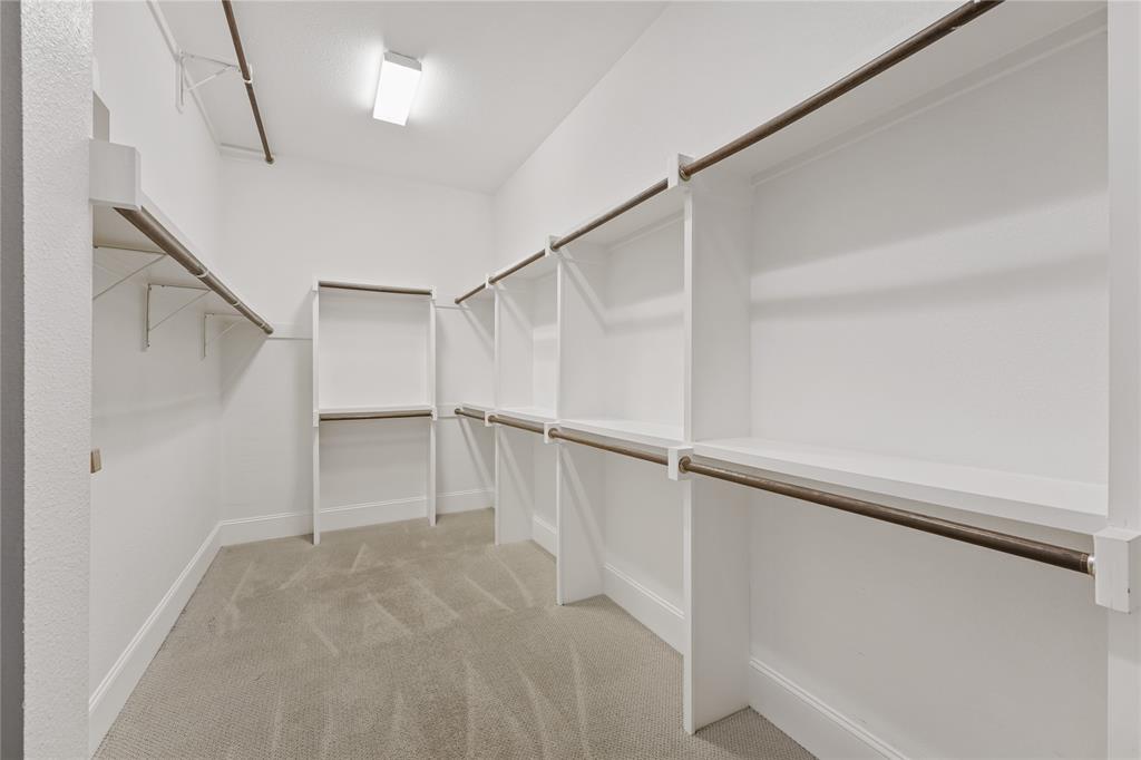 4026 North Cresthaven Road Dallas, TX 75209 - Photo 12 of 22 a view of an empty walk in closet