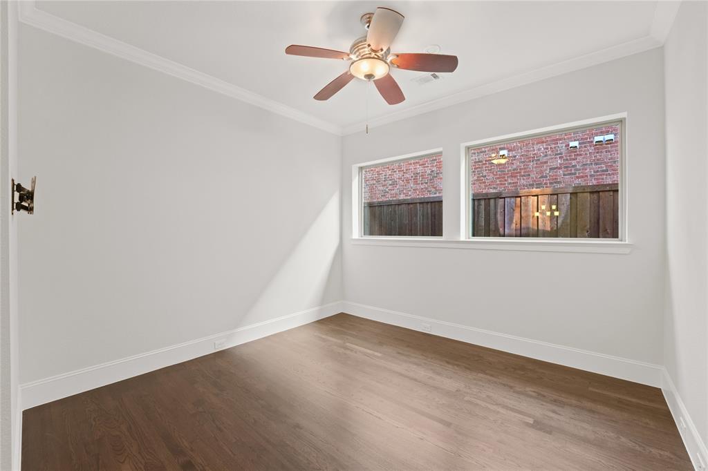 4026 North Cresthaven Road Dallas, TX 75209 - Photo 14 of 22 a view of an empty room with a window