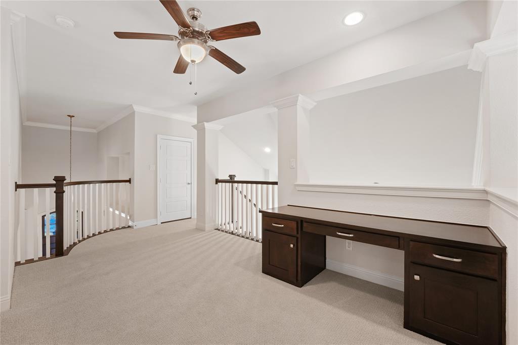 4026 North Cresthaven Road Dallas, TX 75209 - Photo 16 of 22 a kitchen with stainless steel appliances a sink and cabinets