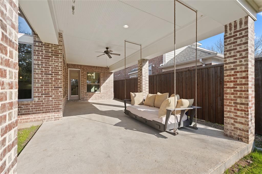 4026 North Cresthaven Road Dallas, TX 75209 - Photo 20 of 22 a bedroom with furniture and a window