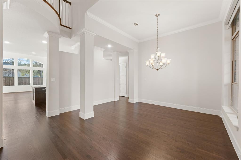 4026 North Cresthaven Road Dallas, TX 75209 - Photo 2 of 22 a view of a room with wooden floor and window