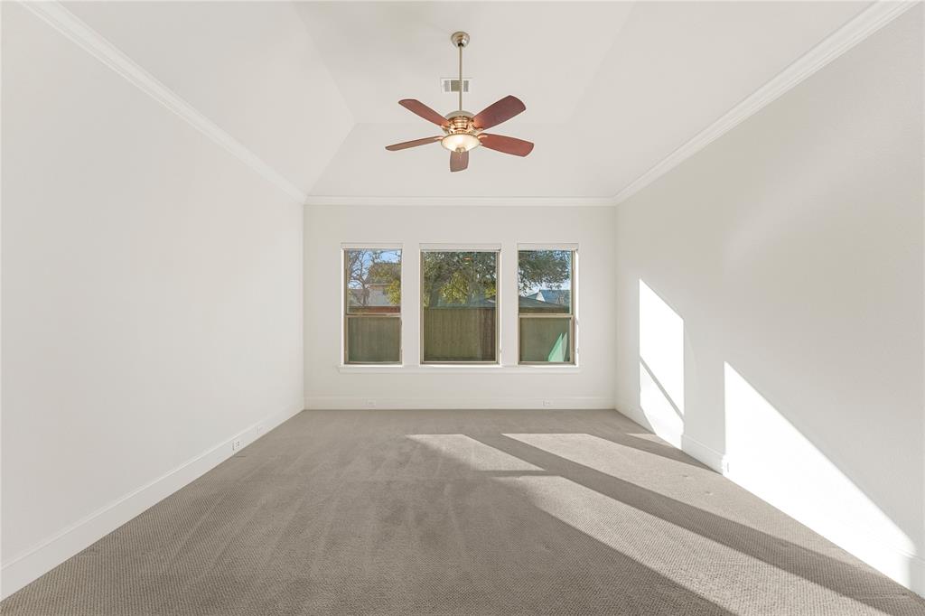 4026 North Cresthaven Road Dallas, TX 75209 - Photo 9 of 22 a view of a livingroom with a ceiling fan and window