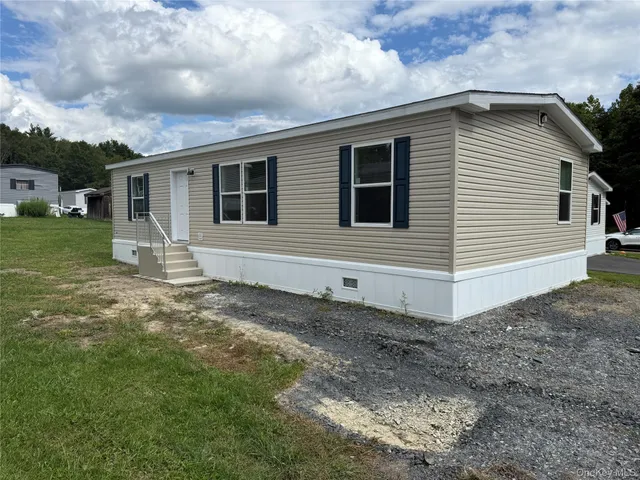 a front view of house with yard