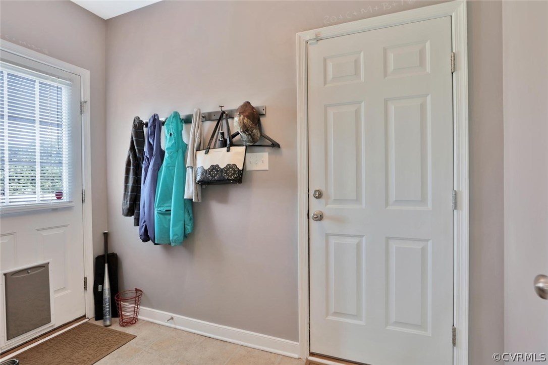 8910 Beaver Bridge Road Moseley, VA 23120 - Photo 14 of 44 a view of walk in closet with clothes and shoes