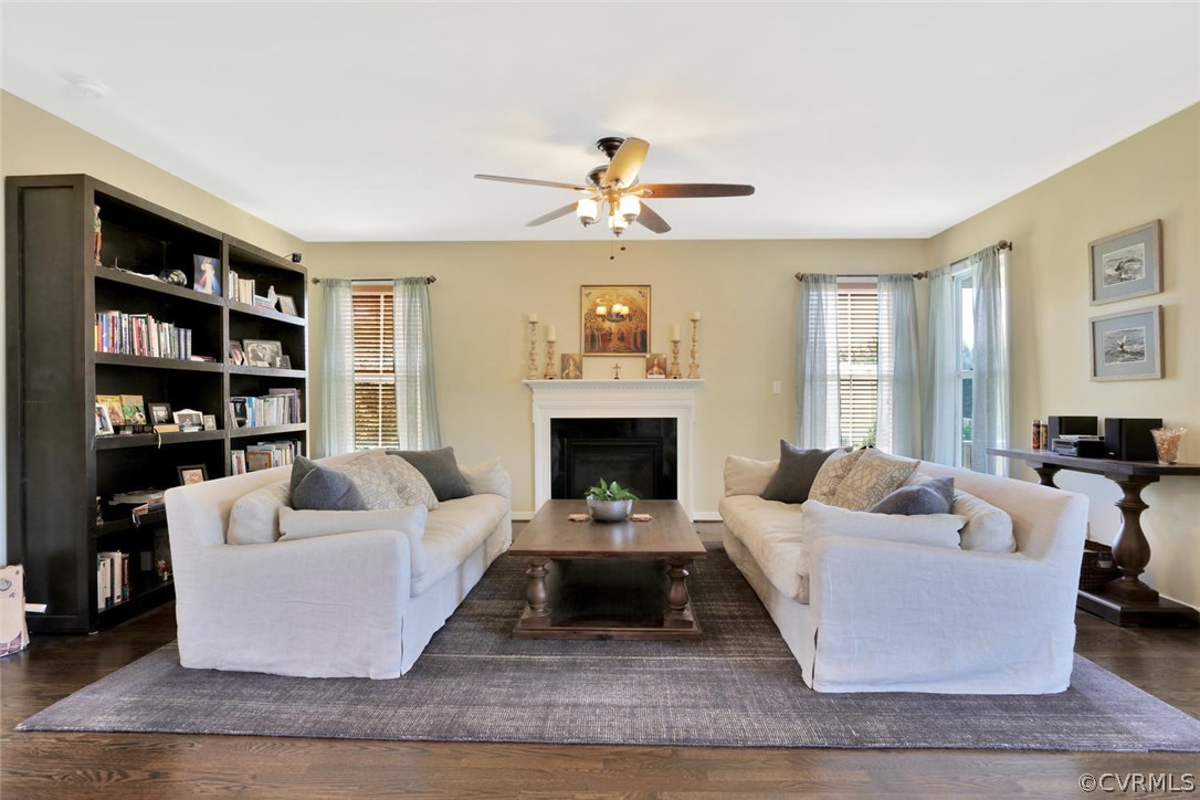 8910 Beaver Bridge Road Moseley, VA 23120 - Photo 15 of 44 a living room with furniture and a fireplace