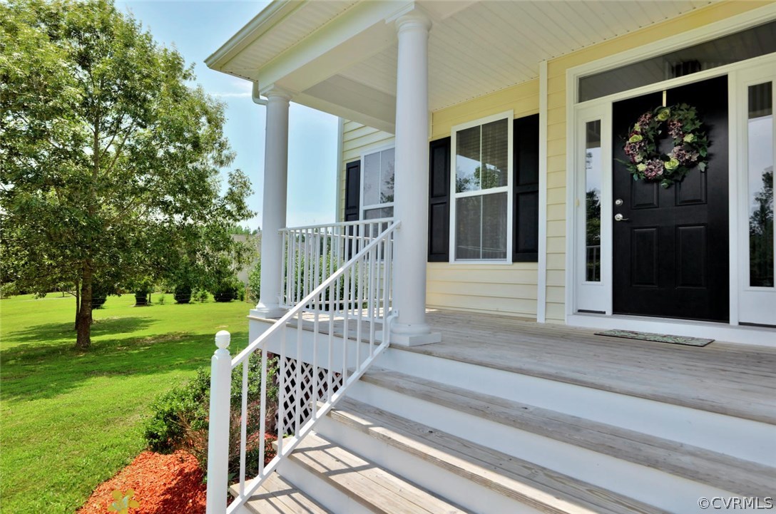 8910 Beaver Bridge Road Moseley, VA 23120 - Photo 3 of 44 a view of a house with a deck