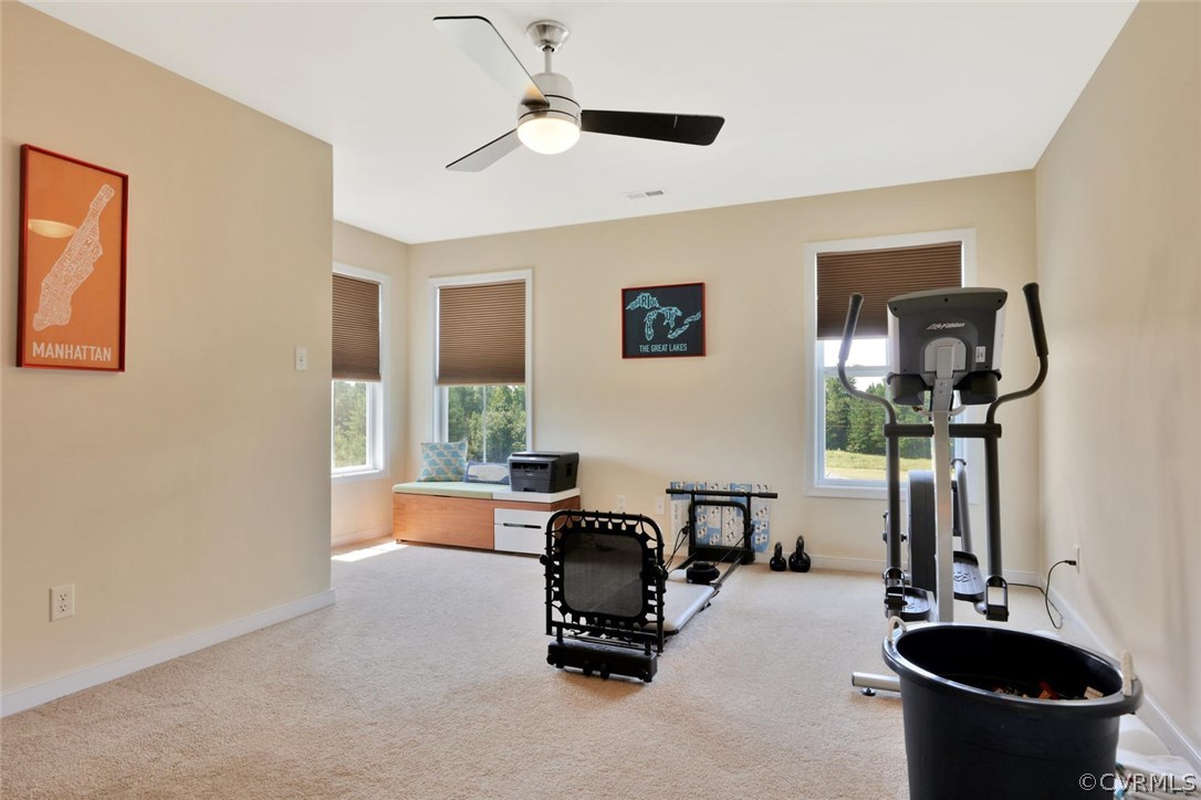 8910 Beaver Bridge Road Moseley, VA 23120 - Photo 32 of 44 a view of a livingroom with furniture and a window