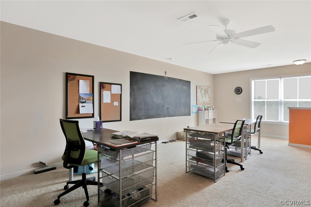 8910 Beaver Bridge Road Moseley, VA 23120 - Photo 34 of 44 a workspace with furniture and a window