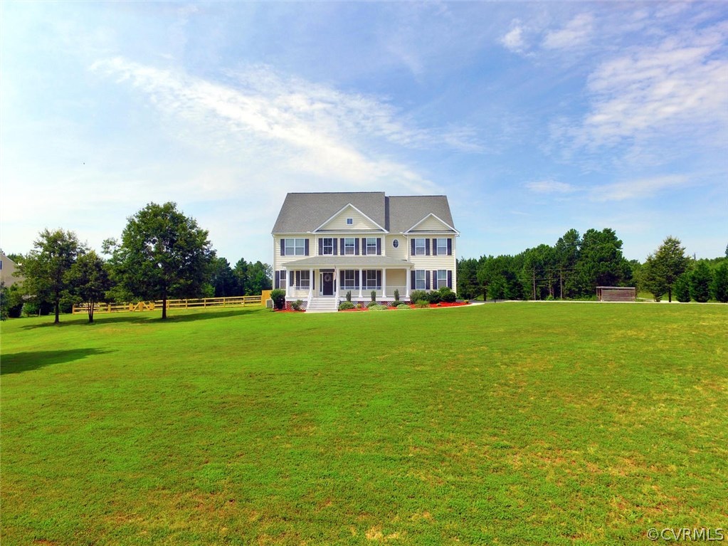 8910 Beaver Bridge Road Moseley, VA 23120 - Photo 42 of 44 a view of a house with a big yard