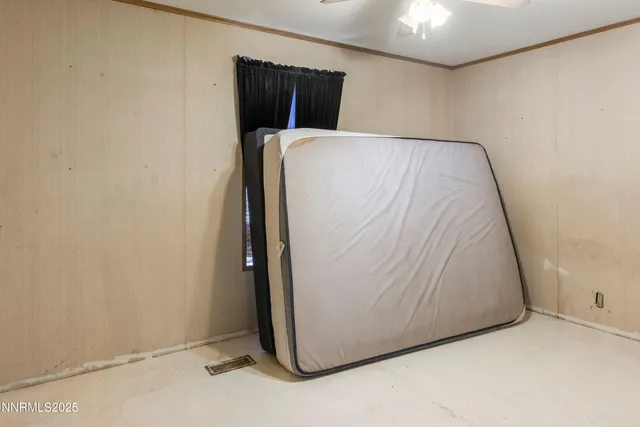 a bathroom with a sink vanity mirror and toilet