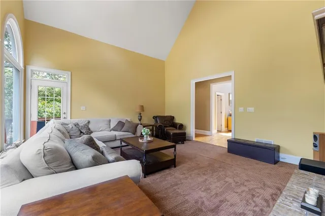 a living room with furniture and a couch