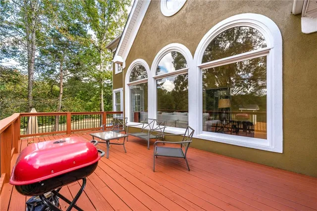 a view of a living room and hall with wooden floor