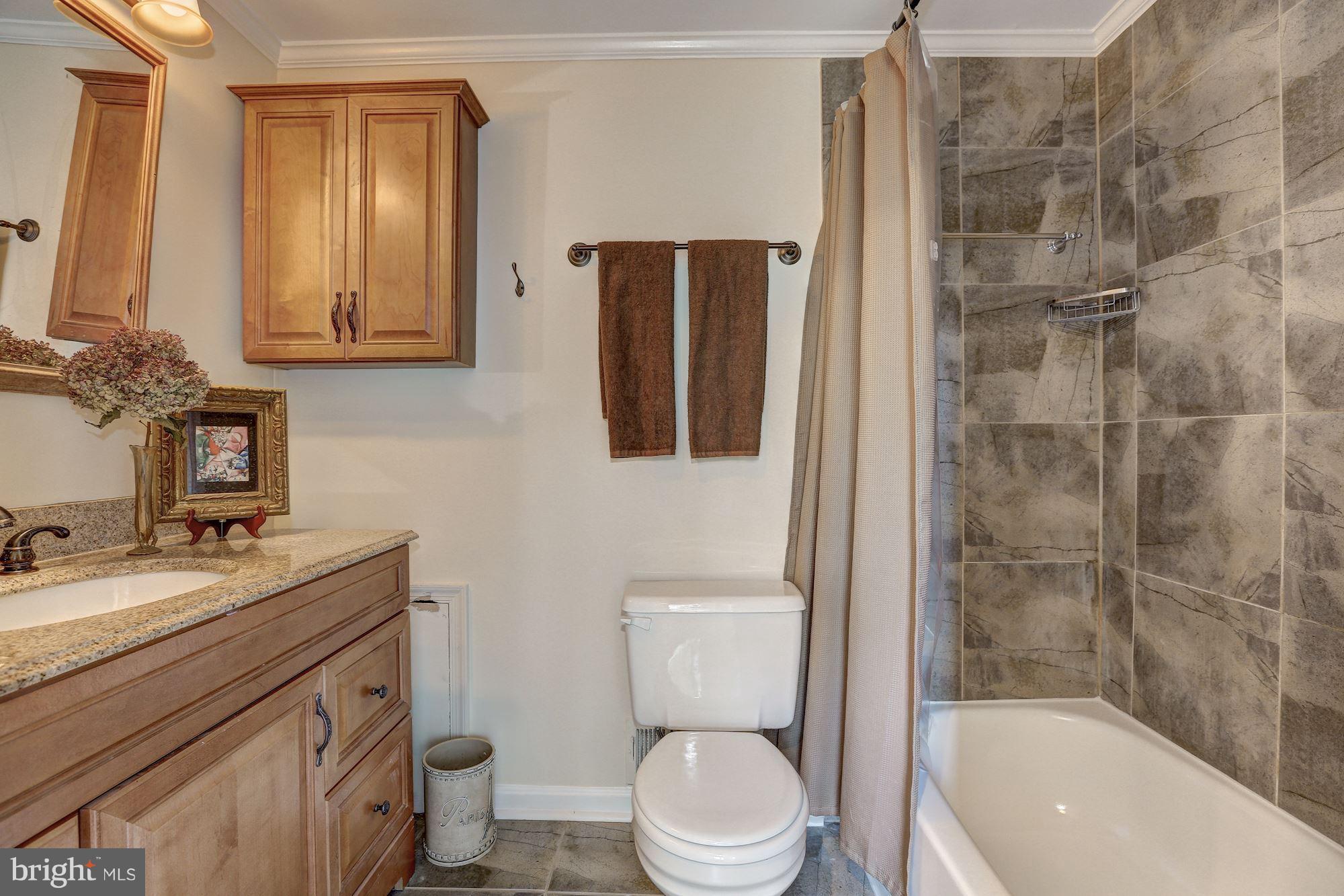 641 Concerto Lane Silver Spring, MD 20901 - Photo 16 of 30 Updated bath with ceramic title flooring