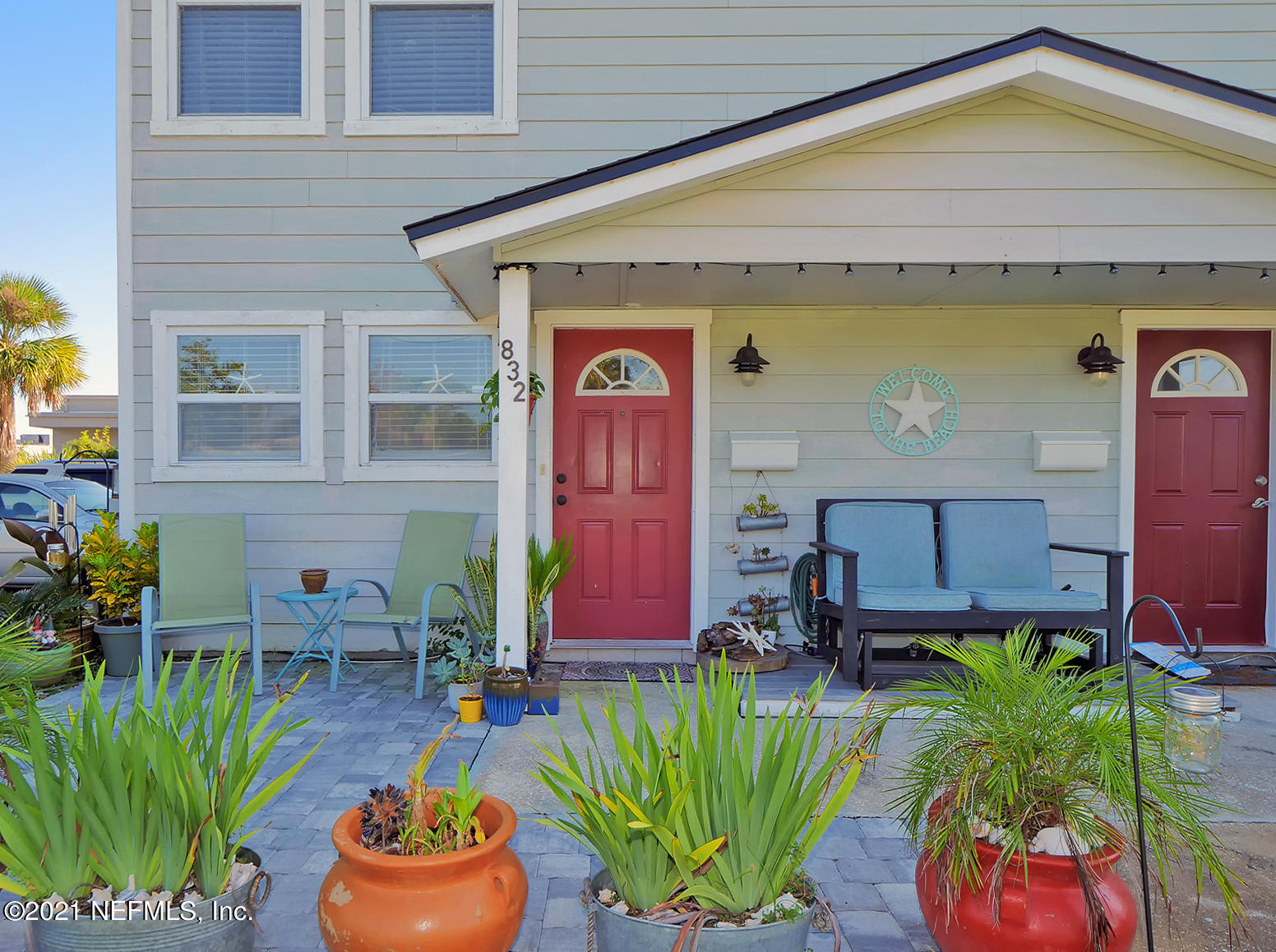 832 Cavalla Road Atlantic Beach, FL 32233 - Photo 2 of 34 a view of front door and lounge chair