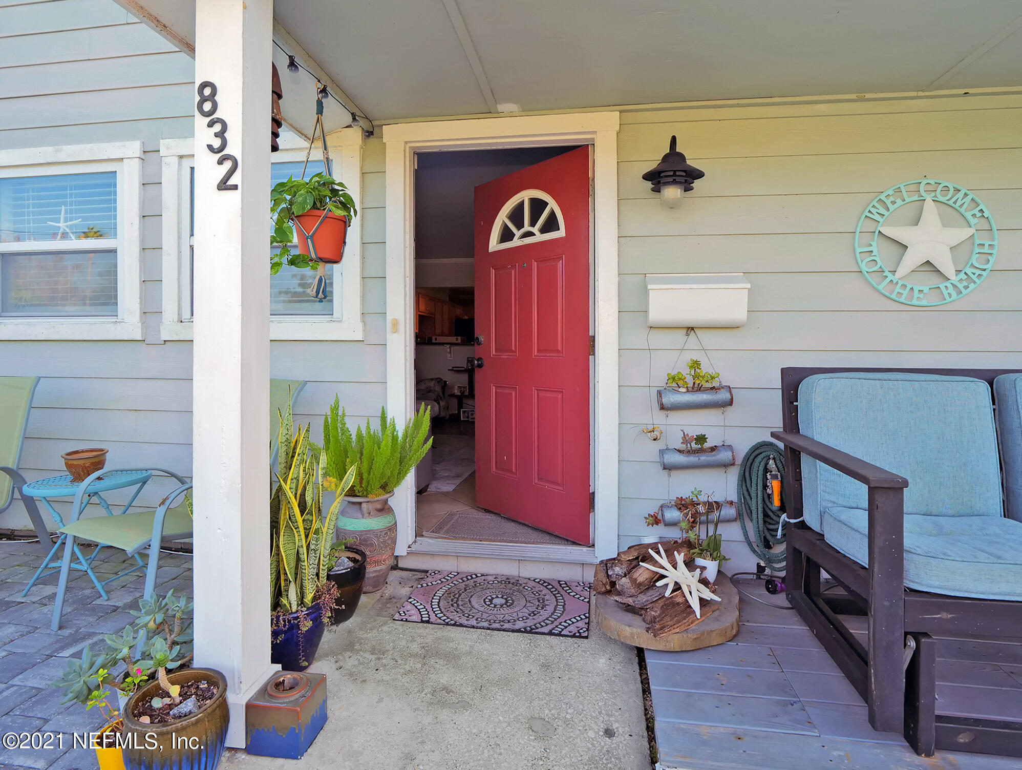 832 Cavalla Road Atlantic Beach, FL 32233 - Photo 3 of 34 a front view of a house with entryway