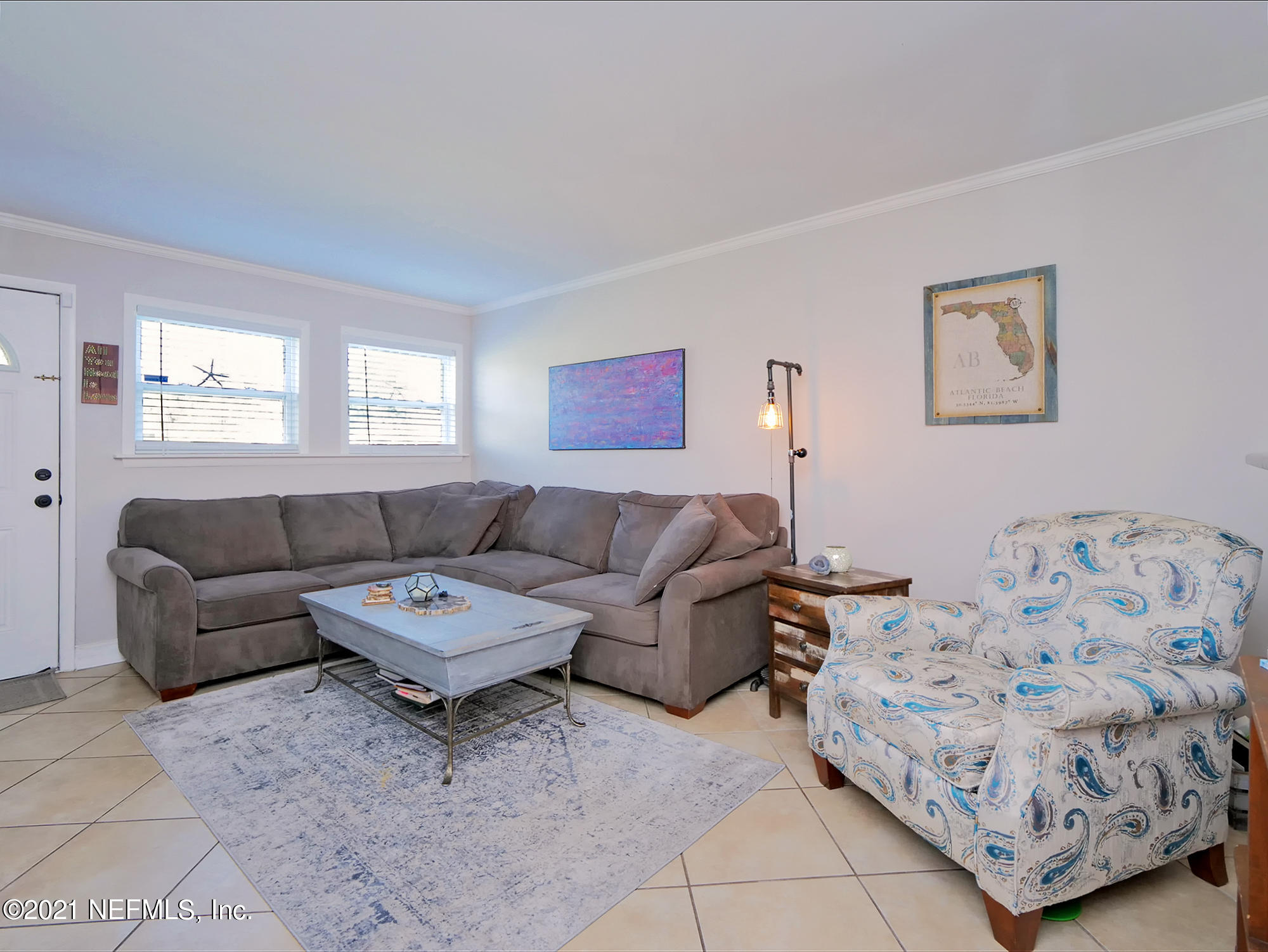 832 Cavalla Road Atlantic Beach, FL 32233 - Photo 4 of 34 a living room with furniture and a couch