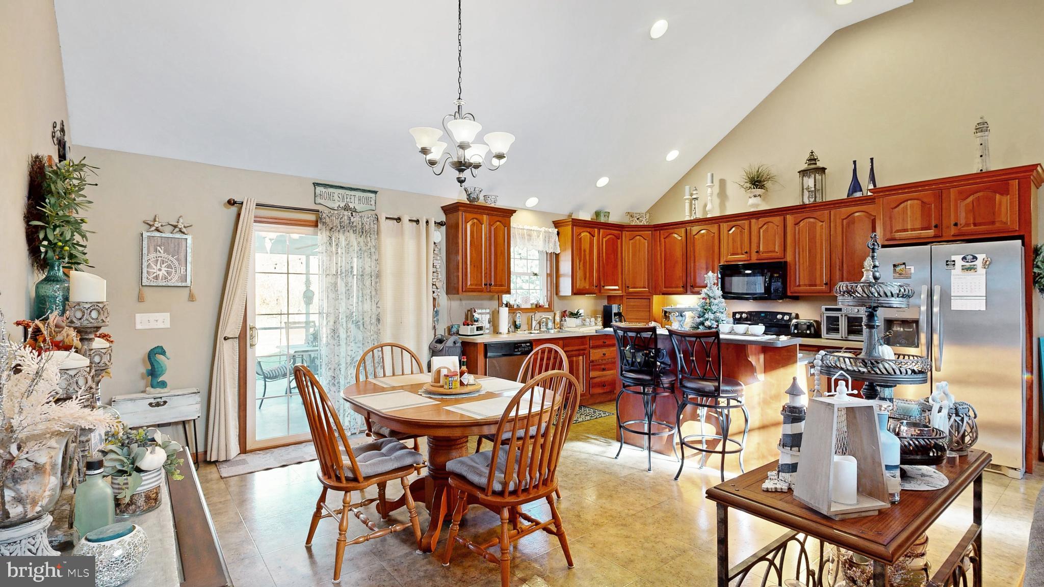 11872 Shawnee Road Greenwood, DE 19950 - Photo 25 of 55 a view of a dining room with furniture window and outside view