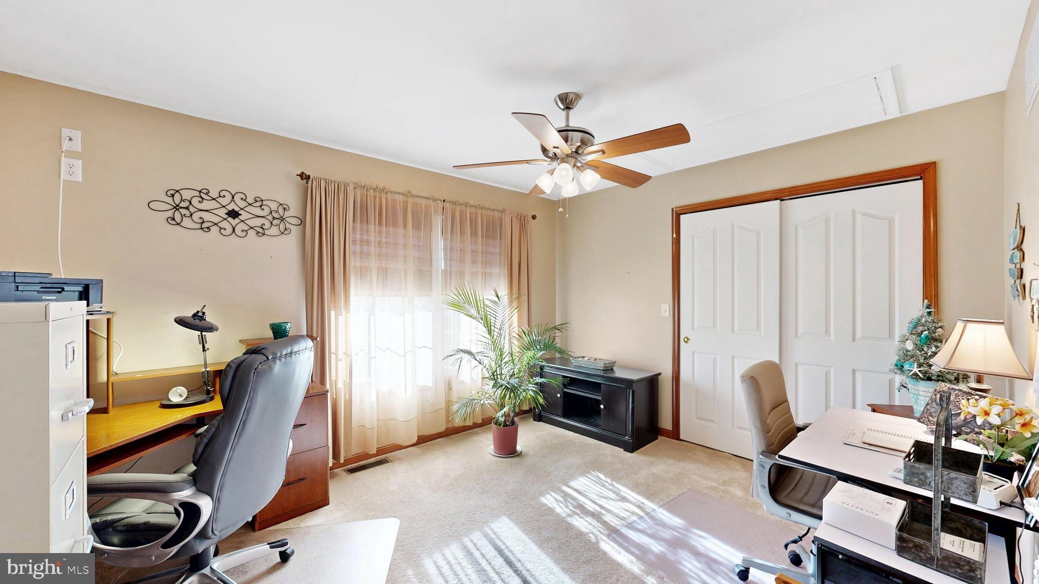11872 Shawnee Road Greenwood, DE 19950 - Photo 33 of 55 a bedroom with furniture and a window