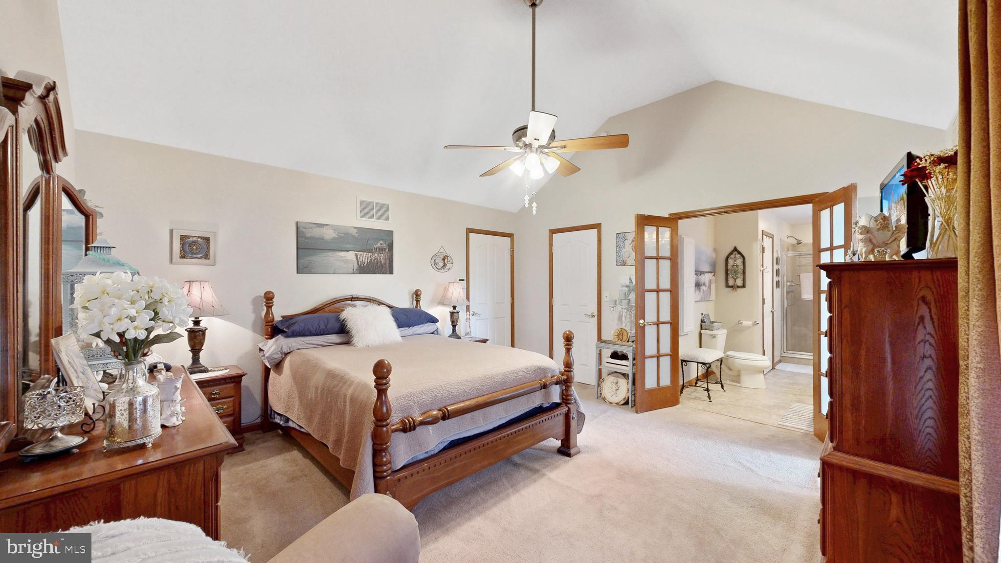 11872 Shawnee Road Greenwood, DE 19950 - Photo 39 of 55 a bedroom with bed and wooden floor