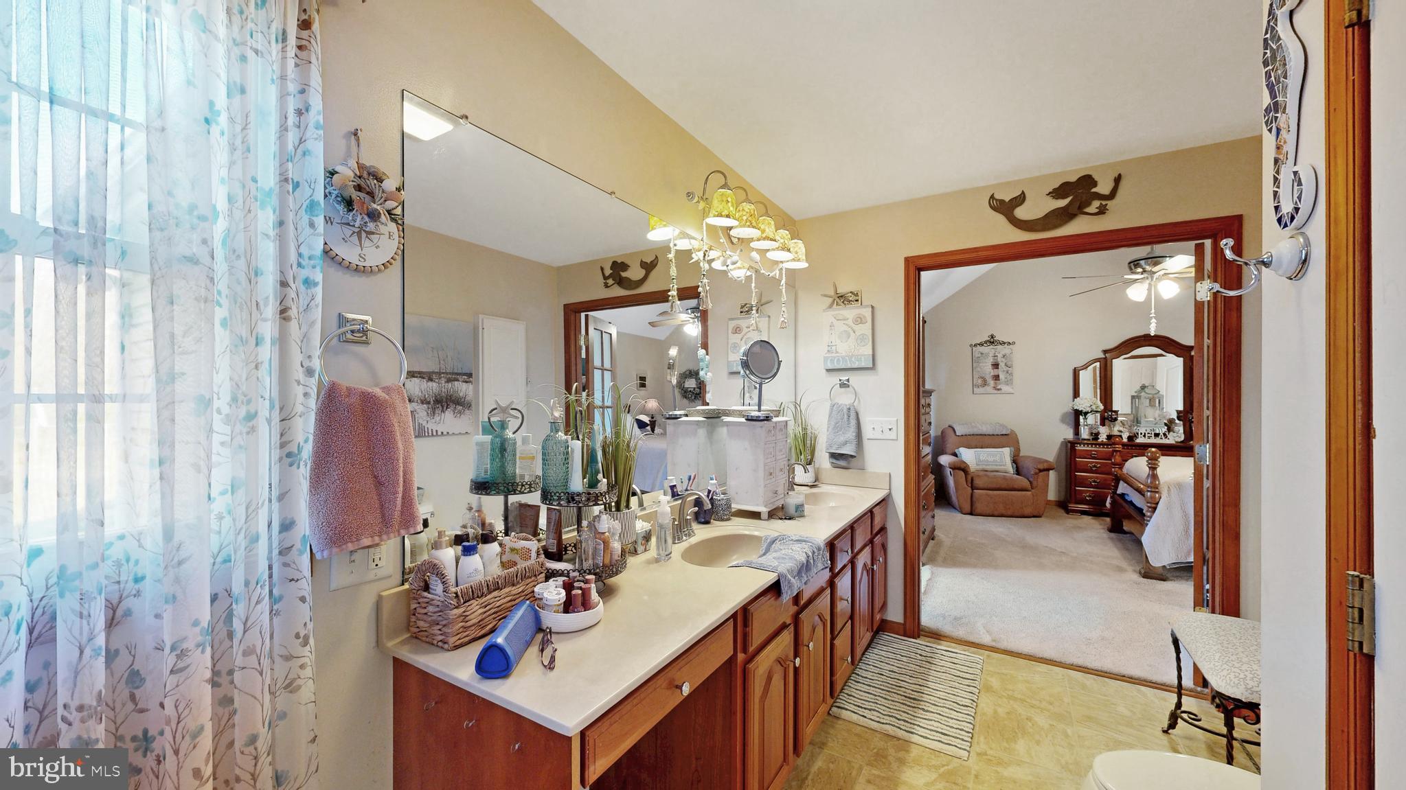 11872 Shawnee Road Greenwood, DE 19950 - Photo 43 of 55 a view of living room with furniture and a chandelier