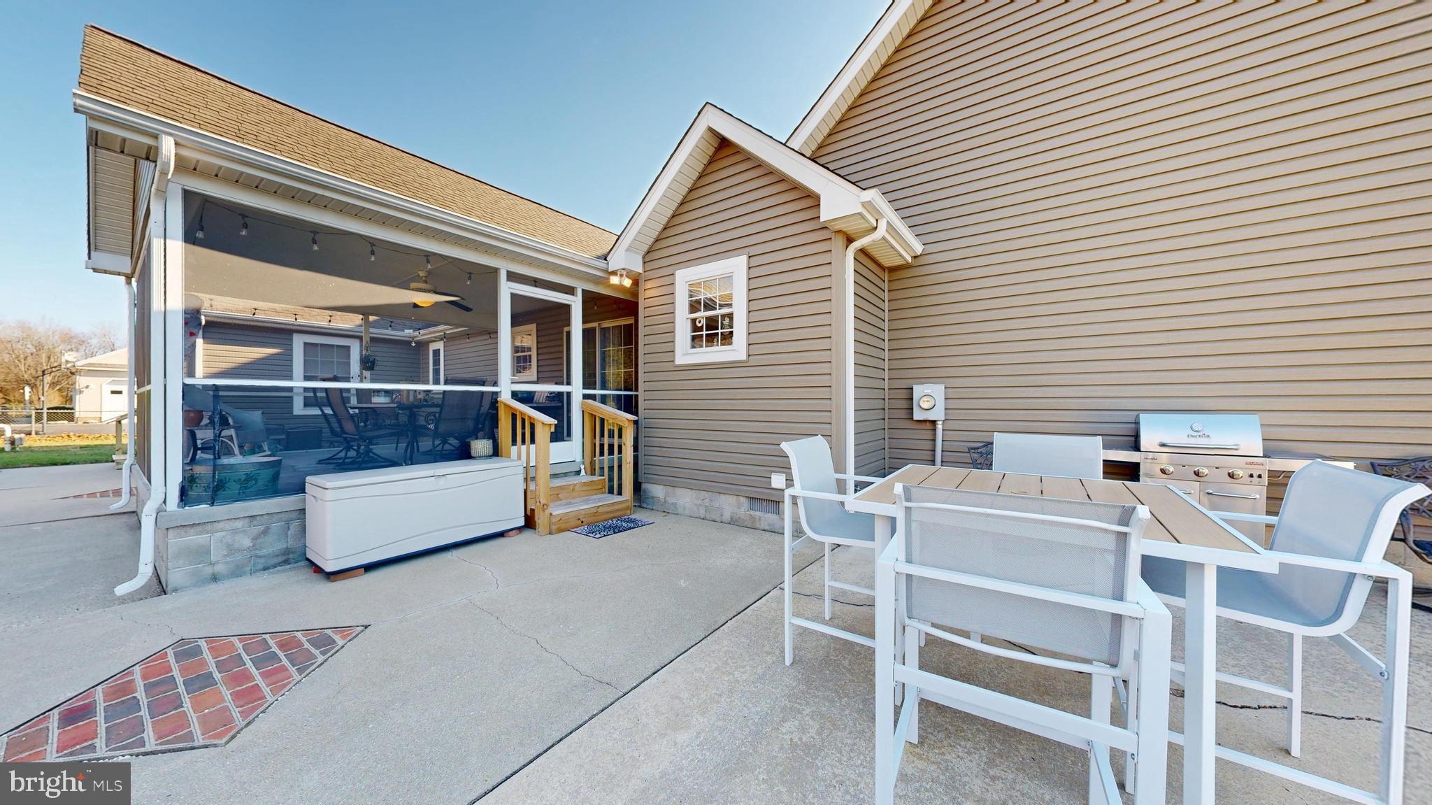 11872 Shawnee Road Greenwood, DE 19950 - Photo 47 of 55 a view of a patio with a table and chairs and couches
