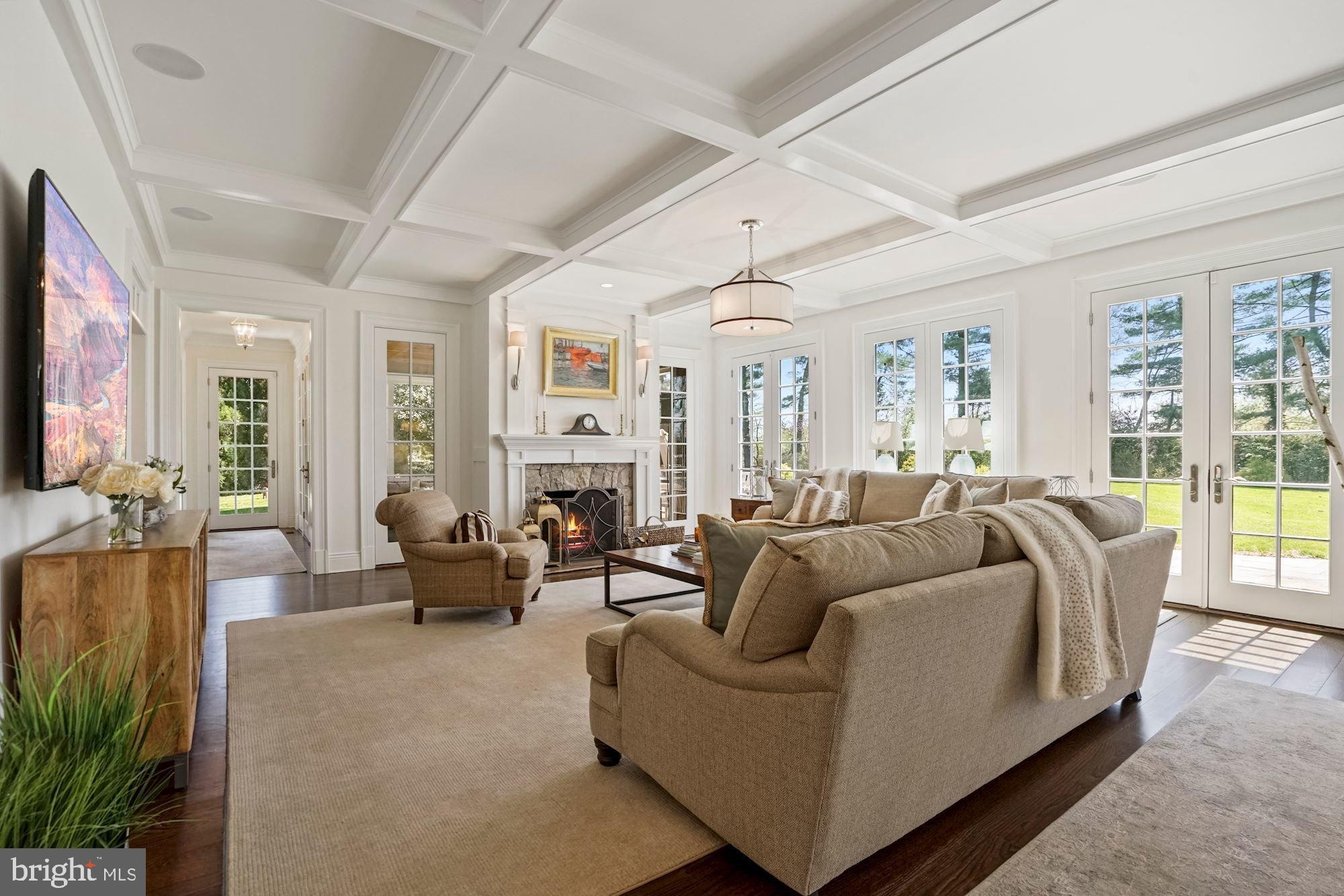 1031 Pine Hill Road McLean, VA 22101 - Photo 15 of 39 a living room with furniture and a flat screen tv