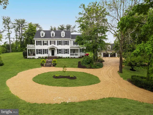 a view of a house with a swimming pool